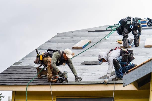 Professional Gutter Installation technician working in Bringhurst, IN
